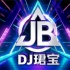 J��